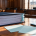 Thick case bundle and handwritten notes on a wooden desk, representing the importance of children's accounts in family court evidence